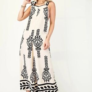 NWT- Chic Black and Cream Patterned Jumpsuit - Size Medium